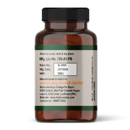 Back label of Herbovedam Power Booster bottle showing manufacturing details, batch number, expiry date, and manufacturer&